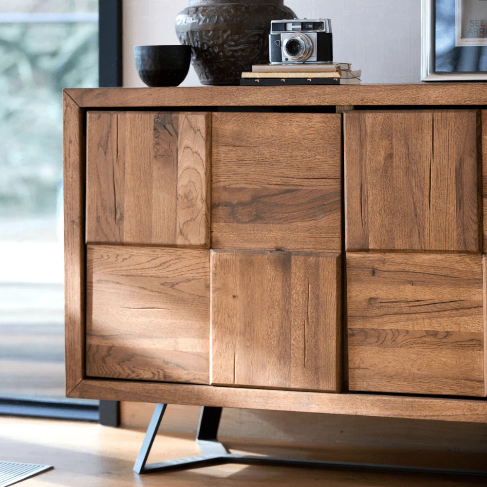 Solid oak coffee table on a laminate floor in living room