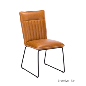 tan faux leather dining chair on white background