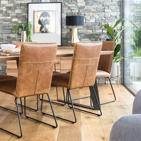 tan brooklyn dining chairs at table